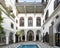 The entrance to a room in the courtyard with pool at the Riad Maison Bleue in in Fes, Morocco.