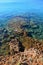 Entrance to the sea with unique red rocks on northern beach of Vir island in Croatia, Adriatic