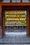 Entrance to shinto shrine with rows colourful paper lanterns, ky