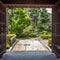 Entrance to a small public traditional garden in the Teramachi district of Kanazawa, Japan.