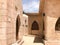Entrance to the street, a lane with stone and buildings, the passage between the buildings in the Arab Islamic Islamic warm tropic
