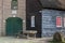 Entrance of a typical dutch grain mill on a sunny day