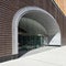 The entrance of The Wheeler, a mixed-use building at 181 Livingston St in Downtown Brooklyn, NYC above Macy`s Dept Store