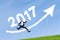 Entrepreneur leaping with number 2017 and arrow