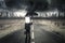 Entrepreneur standing on road with thunderstorm