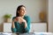 Entrepreneur Woman Smiling Having Coffee At Workplace Sitting In Office