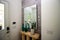 Entry Hallway With Mirror And Decor On Wooden Table