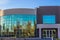 Entry To Modern Building With Reflective Curved Glass