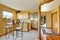 Entryway of duplex house. View of dining area with cabinets