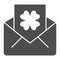 Envelope with clover postcard solid icon. Open letter with shamrock glyph style pictogram on white background. Patrick