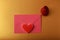 Envelope  red rosebud and heart.