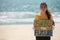 Environmental Activist Standing on Beach