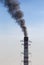 Environmental Damage: Air Pollution. The black smoke of the pipe