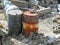 Environmental damage damage garbage rubbish site oil cans tip building