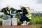 Environmental Engineers Team Take Water Samples at Natural Water Sources. Water that smells bad Near Farmland, Fish Ponds May Be