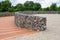 Environmental object, gabion fence wall from steel mesh with stones