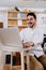 Environmental portrait of a furniture designer maker in his workshop