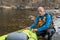 Environmental portrait of a senior kayaker