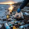 Environmentally conscious woman cleaning up trash on a sandy beach during a breathtaking sunset