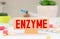 ENZYME word on wood blocks, medical concept