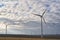 Eolian field and wind turbines farmon a cloudy day