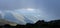 Eolic turbines, framed using clouds and rock formation