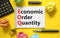 EOQ economic order quantity symbol. Concept words EOQ economic order quantity on white note on beautiful yellow background. Black