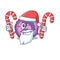 Eosinophil cell Cartoon character in Santa costume with candy
