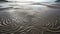 Ephemeral Patterns: Striking Symmetrical Waves In Scottish Beach