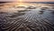 Ephemeral Sand Patterns At Sunset: Organic Forms Blending With Geometric Shapes