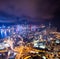 Epic aerial view of night scene of Victoria Harbour, Hong Kong