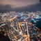 Epic aerial view of night scene of Victoria Harbour, Hong Kong