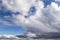 Epic Blue sky with big white fluffy cumulus clouds. Abstract background texture, copy space