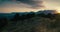 Epic cinematic panorama movement of epic mountain landscape at sunset on travel