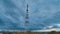 Epic Cloudscape timelapse. Autumn Cityscape with dramatic clouds, Skyscrapers and radio tower