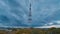 Epic Cloudscape timelapse. Autumn Cityscape with dramatic clouds, Skyscrapers and radio tower