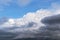 Epic dramatic Storm sky, dark and white big cumulus clouds on blue sky