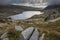 Epic early Autumn Fall landscape of view along Ogwen Valley in Snowdonia National Park under dramatic evening sky with copy space