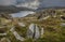 Epic early Autumn Fall landscape of view along Ogwen Valley in Snowdonia National Park under dramatic evening sky with copy space