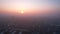 Epic gray smog is visible at sunset over the city