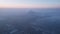 Epic gray smog is visible at sunset over the city