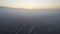 Epic gray smog is visible at sunset over the city