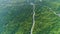 Epic green forest landscape long road aerial view