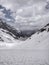 Epic panoramic view of Kullu Valley under snow in the month of June from top of Indian Himalayan Mountain peak on a Humpta pass Tr