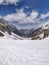 Epic panoramic view of Kullu Valley under snow in the month of June from top of Indian Himalayan Mountain peak on a Humpta pass Tr