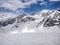 Epic panoramic view of mighty sharp peak mountains of Spiti Valley under snow in the month of June from top of high altitude India