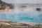 Epic scenic view over colorful geyser basin in Yellowstone National Park.