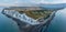 Epic vibrant Summer dawn landscape image of Beachy Head Lighthouse in South Downs National Park in England