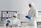 Epidemiological researcher in virus protective cloth working in laboratory. Omicron strain testing process, Coronavirus disease