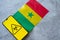 Epidemiological situation in the country Senegal. Flag and smartphone with news and a biohazard symbol.